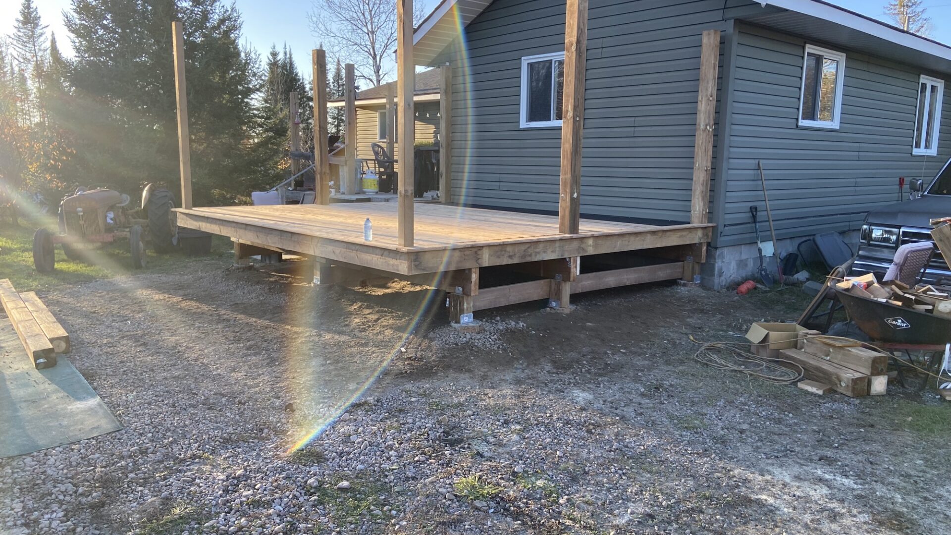 Completed raised deck at golden hour in rural Northern Ontario.