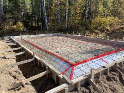 The reinforced, insulated garage slab in its forms seen from the corner
