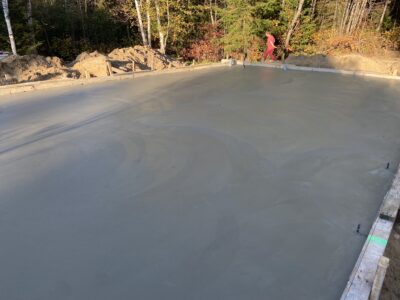 Smooth, freshly finished concrete garage floor slab
