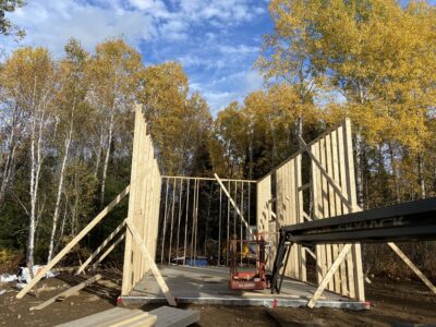 Two braced stud walls forming the corner of the garage